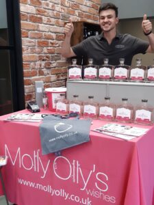 Sam with Molly Ollys Pink Gin
