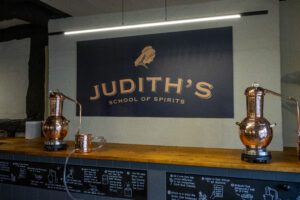 Judith's School of Spirits sign