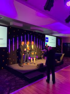 Simon and Peter being presented with one of our awards