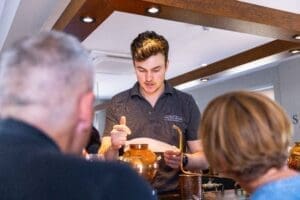 Sam helping with recipe development in a Gin School