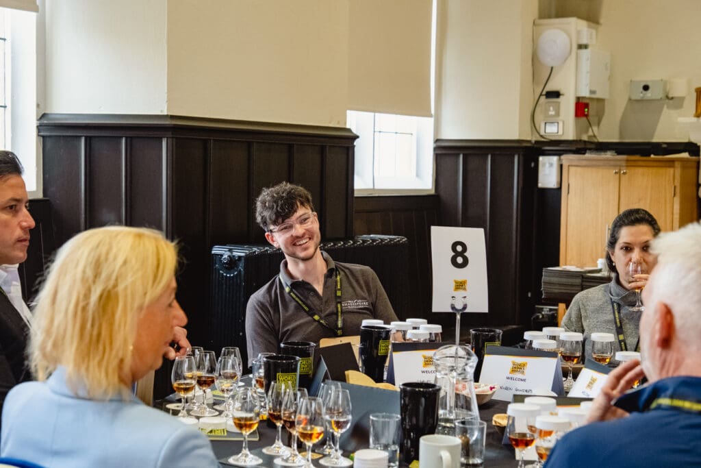 Sam on his tasting panel table